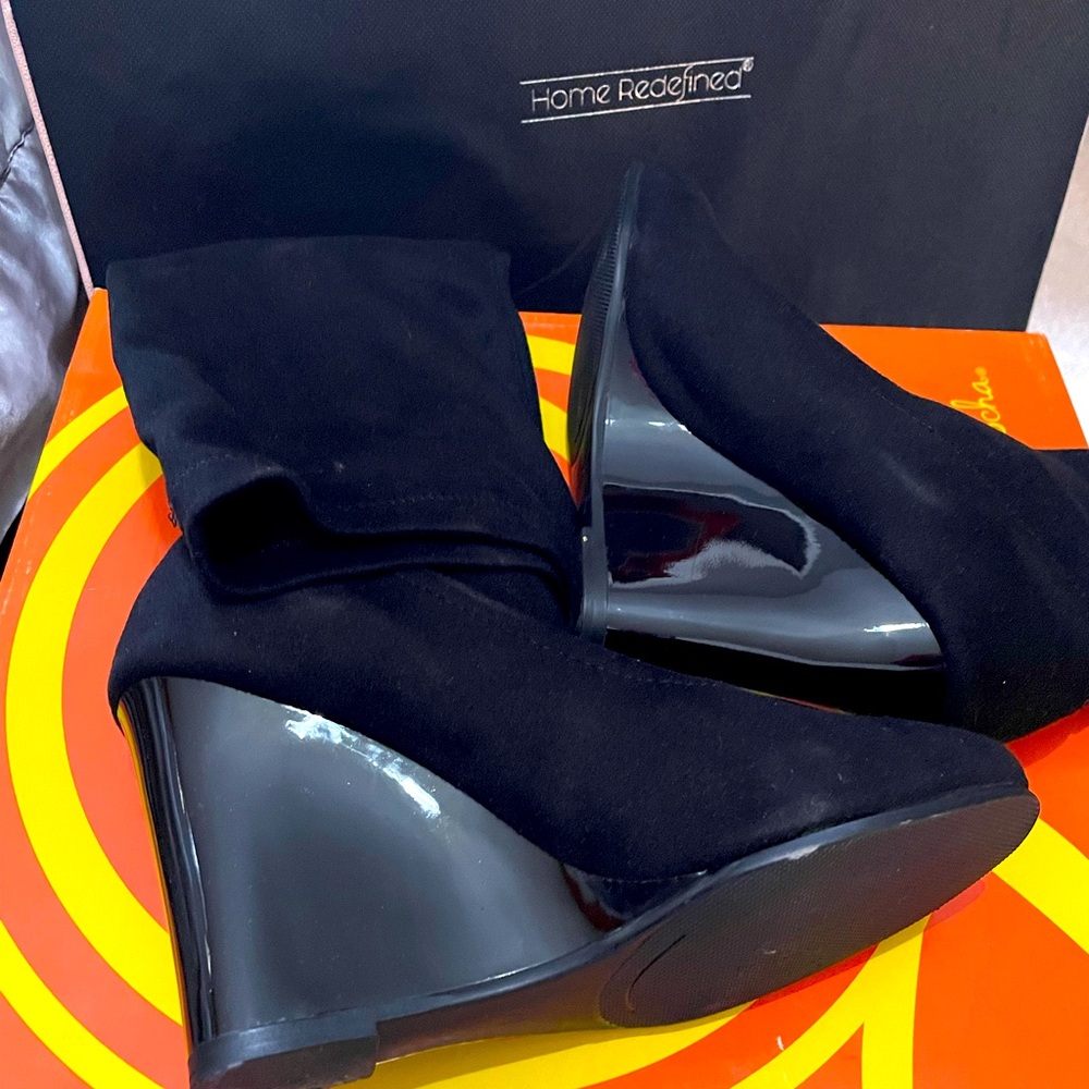 Knee high wedge boots